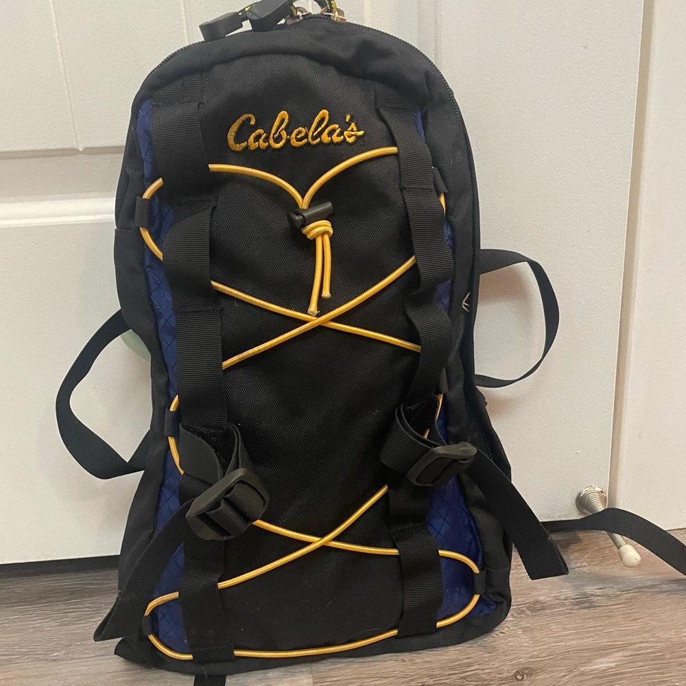 Cabela's Hydration Pack in blue and black with 64 oz bladder